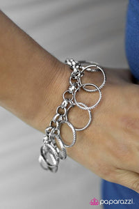 DIZZY Does It - Silver Bracelet - Paparazzi