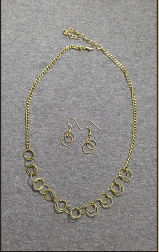 One Ring Leads To Another - Brass Necklace - Paparazzi